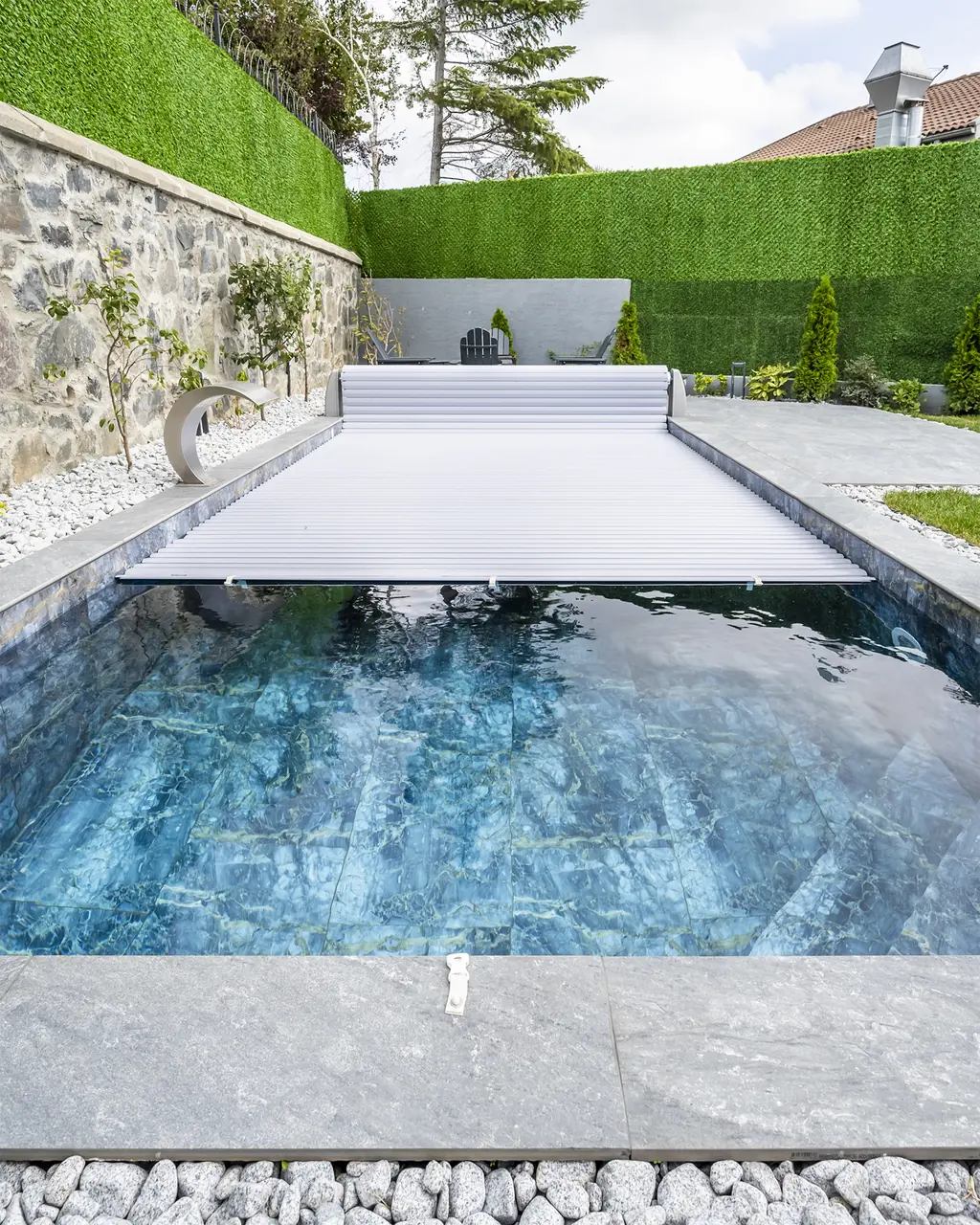Slatted cover over moving pool water – No1Pool